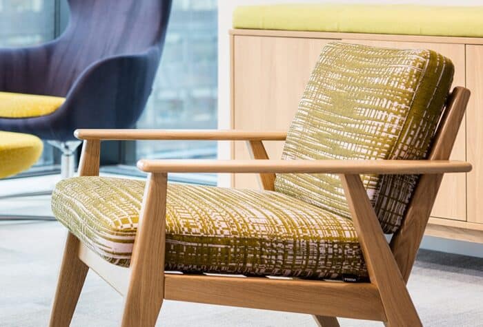 Scandi Lounge Chair close up of chair with patterned upholstery and a natural oak frame