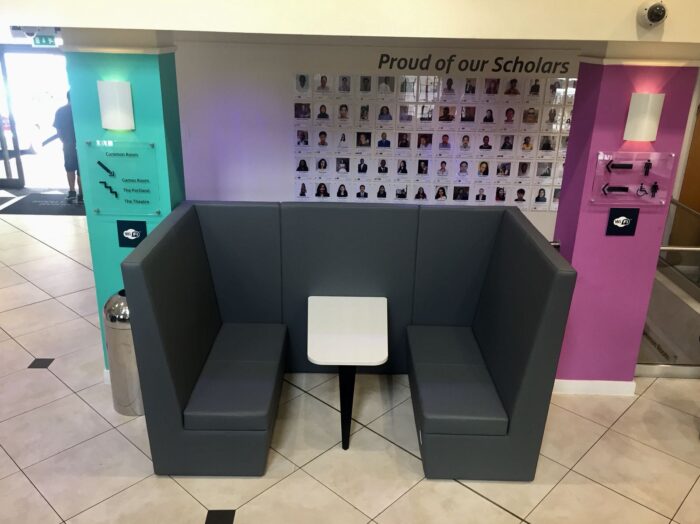 Stella Modular Seating high back 4 seat den shown in a reception space