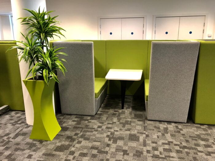 Stella Modular Seating row of high back dens with two tone upholstery shown in an office space
