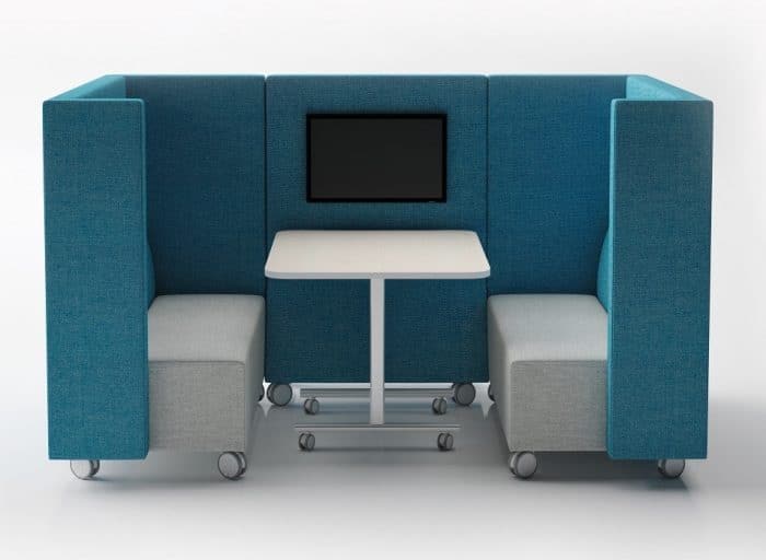 Stream Booths - high back 4 seater booth with half depth arms on optional castors in two tone upholstery, shown with a table on castors and a mounted monitor