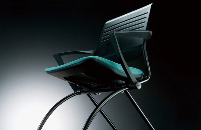 Switch Mobile Chair close up view of chair with green fabric seat cushion and black back and 4 leg frame