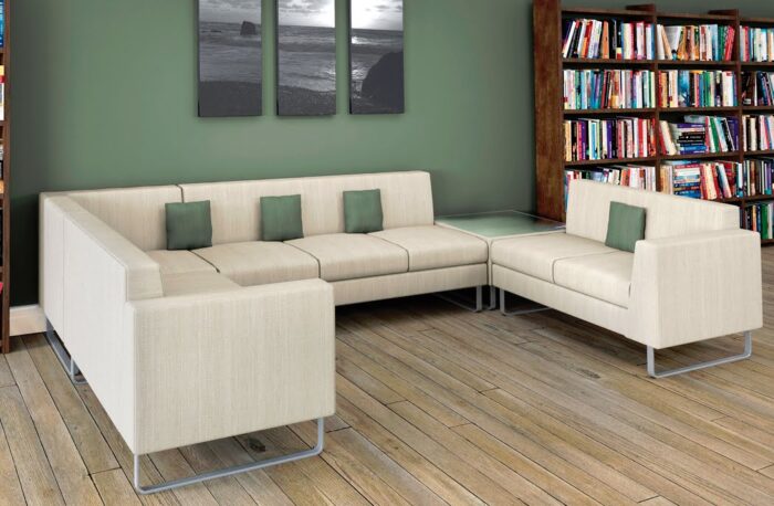 Synergy Soft Seating U shape configuration with corner table, upholstered in cream fabric shown in a breakout area