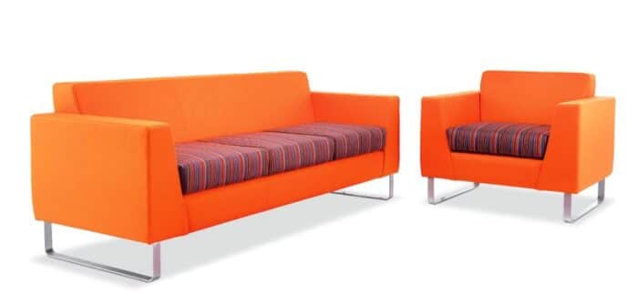 Synergy Solo Soft Seating a three seat sofa and an armchair with two tone upholstery and silver sled frames