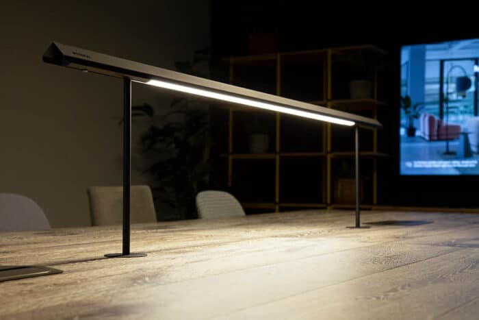 Frovi Task Light shown installed on a collaboration table