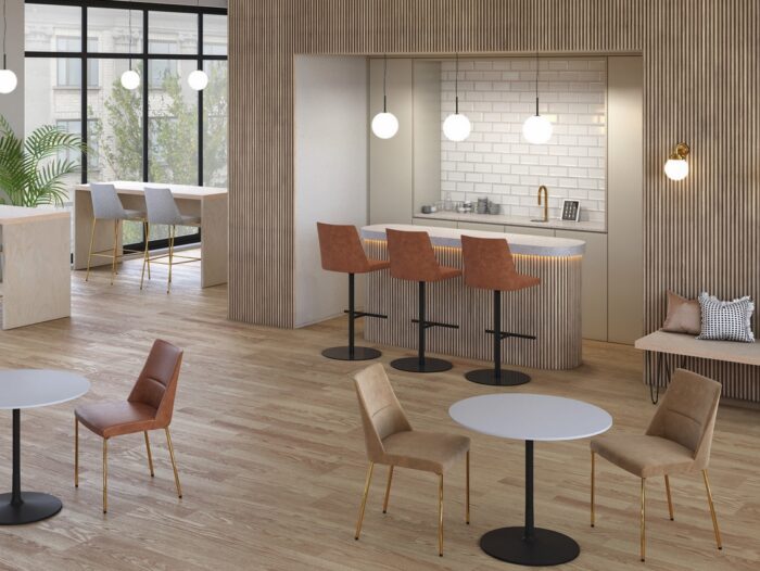 Teapoint unit with an app controlled beverage tap and ligting shown in a dining space with tables, breakfast bar and seating