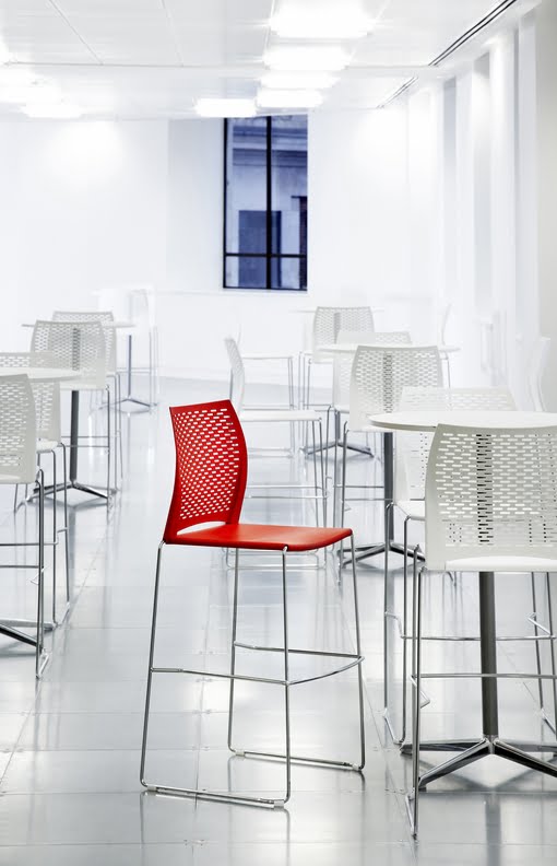 Xpresso High Chair with perforated backs in a breakout area with high tables