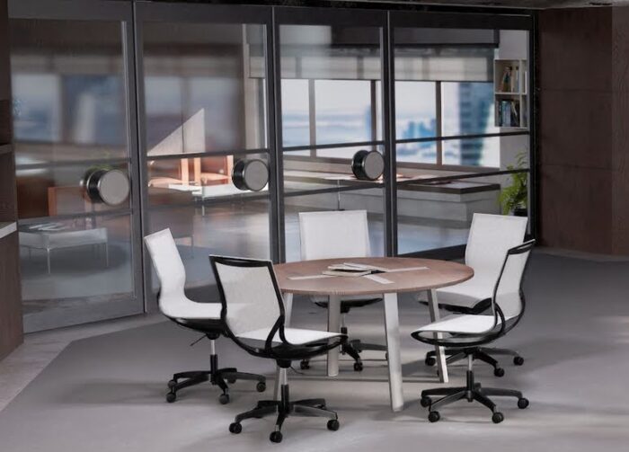 Zero G Workchair group of grey and black chairs with arms around a meeting table