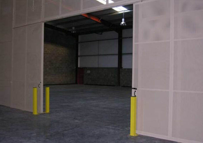 Bespoke security cage forming secure warehouse area viewed from inside