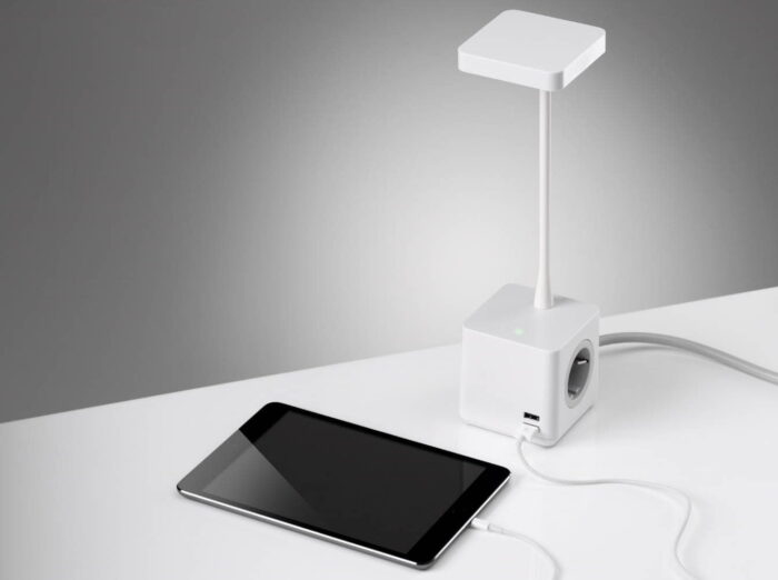 Cubert Desk Lamp recharging an iPad