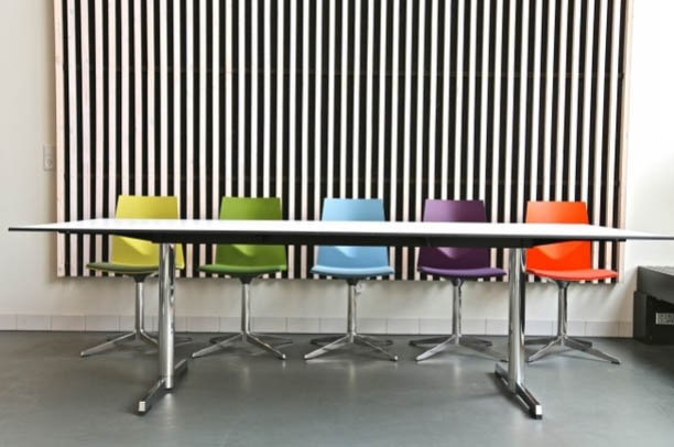 FourMat Meeting Table shown with multi-coloured chairs