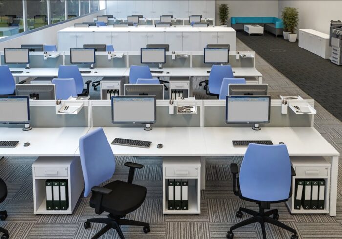 iBench Desk back to back configurations shown with pedestals in an office