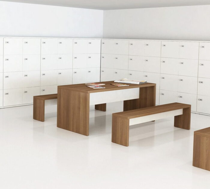 MFC Lockers in white shown behind tables and benches