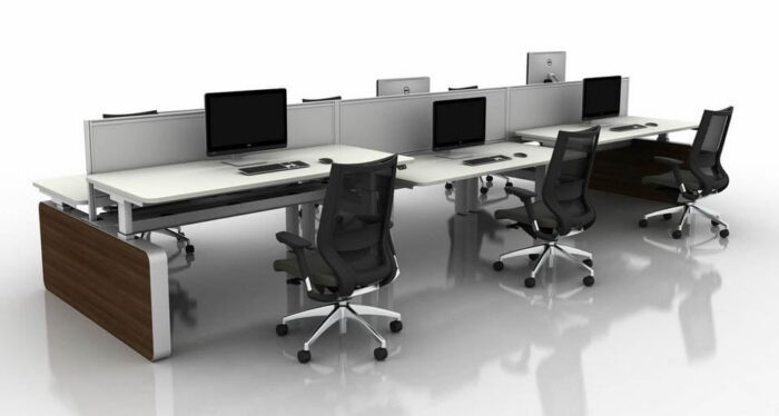 Move Height Adjustable Desks shown with screens and task chairsi