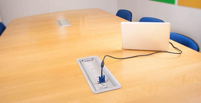 Platinum Power Module shown fitted in a meeting table top