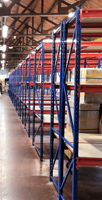Rivet Racking Longspan row of 3 tier shelving units in a warehouse