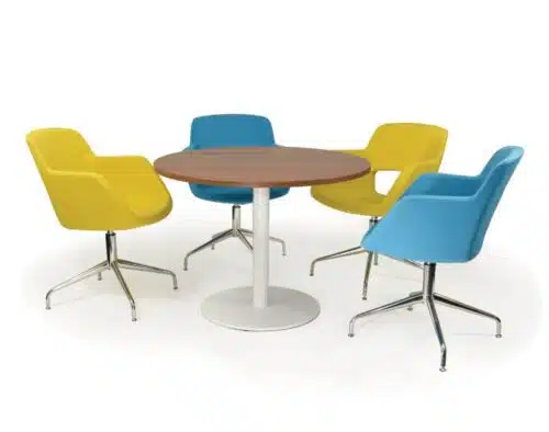 Spin Table showing a circular meeting table with a white base and four meeting chairs