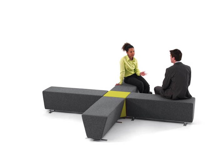 Tandem Seating forming a cross shape with two people sitting and talking